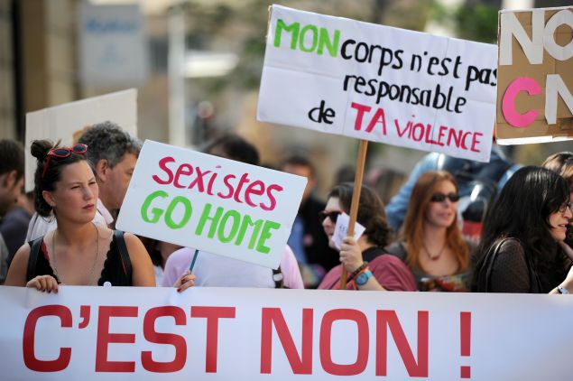 People march through the city taking part in a "Slut Walk" on October 6, 2012 in Aix-en-Provence, southern France. 