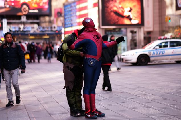 Dozens of men and women earn their livelihood dressing up as cartoon characters in Times Square and preying on tourists who are too kind to say no to their scam.