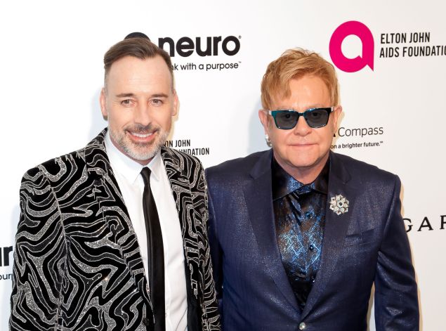 Sir Elton John and husband David Furnish arrive at the 2016 Elton John AIDS Foundation's Academy Awards Viewing Party in West Hollywood, Calif., in February.