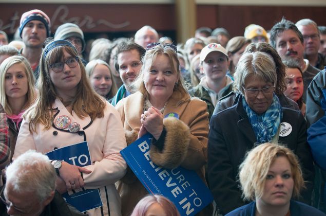 People wait for Democratic presidential candidate Senator Bernie Sanders (D-VT) at a campaign rally at the Grand Theater on April 3, 2016in Wausau, Wisconsin. Voters in Wisconsin go to the polls Tuesday for the state's primary.