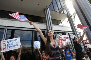 Bernie's supporters protest against the lack of Sanders coverage in front of the CNN building in Los Angeles, California, on April 3, 2016.