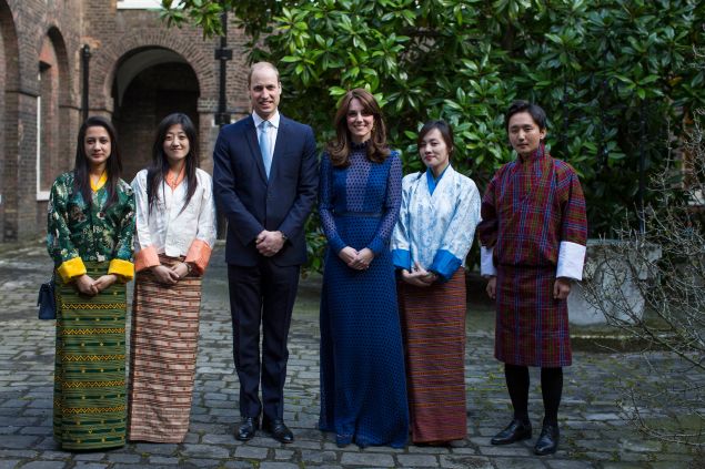 LONDON, ENGLAND - APRIL 6: Prince William, Duke of Cambridge (CL) and Catherine, Duchess of Cambridge (CR) attend a reception ahead of their tour of India and Bhutan at Kensington Palace on April 6, 2016 in London, England.