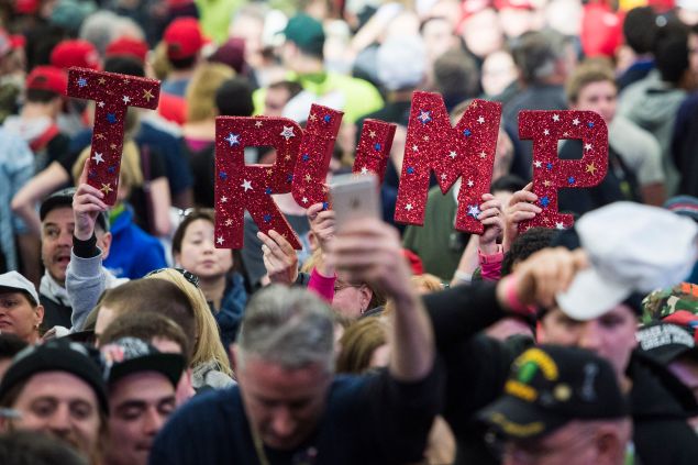 Donald Trump supporters show their enthusiasm at a rally in Bethpage, N.Y., on April 6.