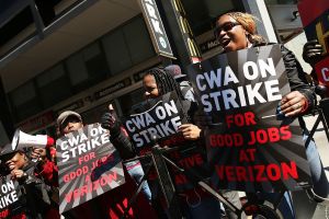 NEW YORK, NEW YORK - APRIL 13: Hundreds of Verizon workers strike outside of the telecommunications company's Brooklyn offices on April 13, 2016 in New York City. Across the nation nearly 40,000 Verizon workers with the Communications Workers of America (CWA) and the International Brotherhood of Electrical Workers (IBEW) walked off their jobs Wednesday demanding a new contract. The workers' contract expired in August, and Verizon management has yet to negotiate a new one citing issues with health care expenses for its retired and current employees.