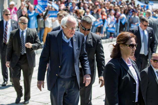 Democratic presidential candidate, U.S. Sen. Bernie Sanders (D-VT) is flanked by his Secret Service detail before greeting supporters following a rally at Roger Williams Park on April 24, 2016 in Providence, Rhode Island. The Rhode Island primary is April 26.