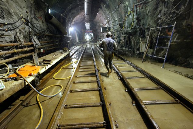 A sandhog worker walks through City Water Tunnel No. 3 October 8, 2003 in New York City.