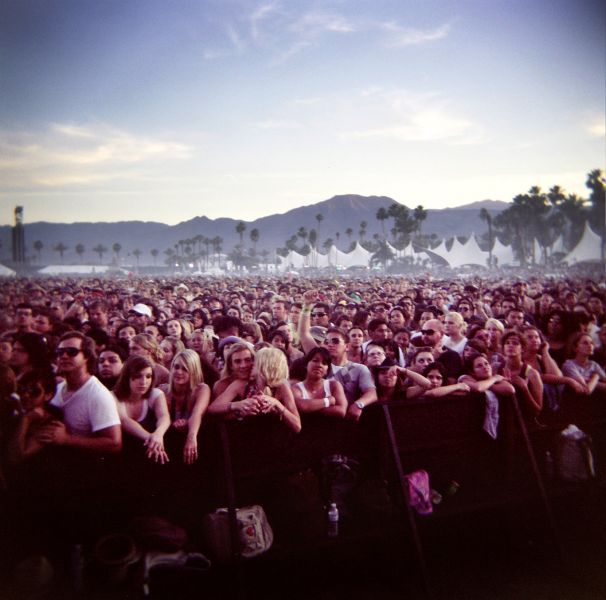 INDIO, CA - APRIL 18: (EDITOR'S NOTE: IMAGE TAKEN WITH A HOLGA CAMERA) Fans take in the music at the Coachella Valley Music and Arts Festival at the Empire Polo Fields on April 18, 2009 in Indio, California. The Coachella Music and Arts Festival has attracted thousands of attendees to the Coachella Valley since 1999.