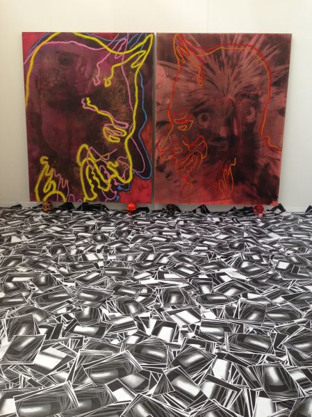 The booth of The General Store, featuring works by Pete Wheeler (wall) and Antoine Aguilar (floor).