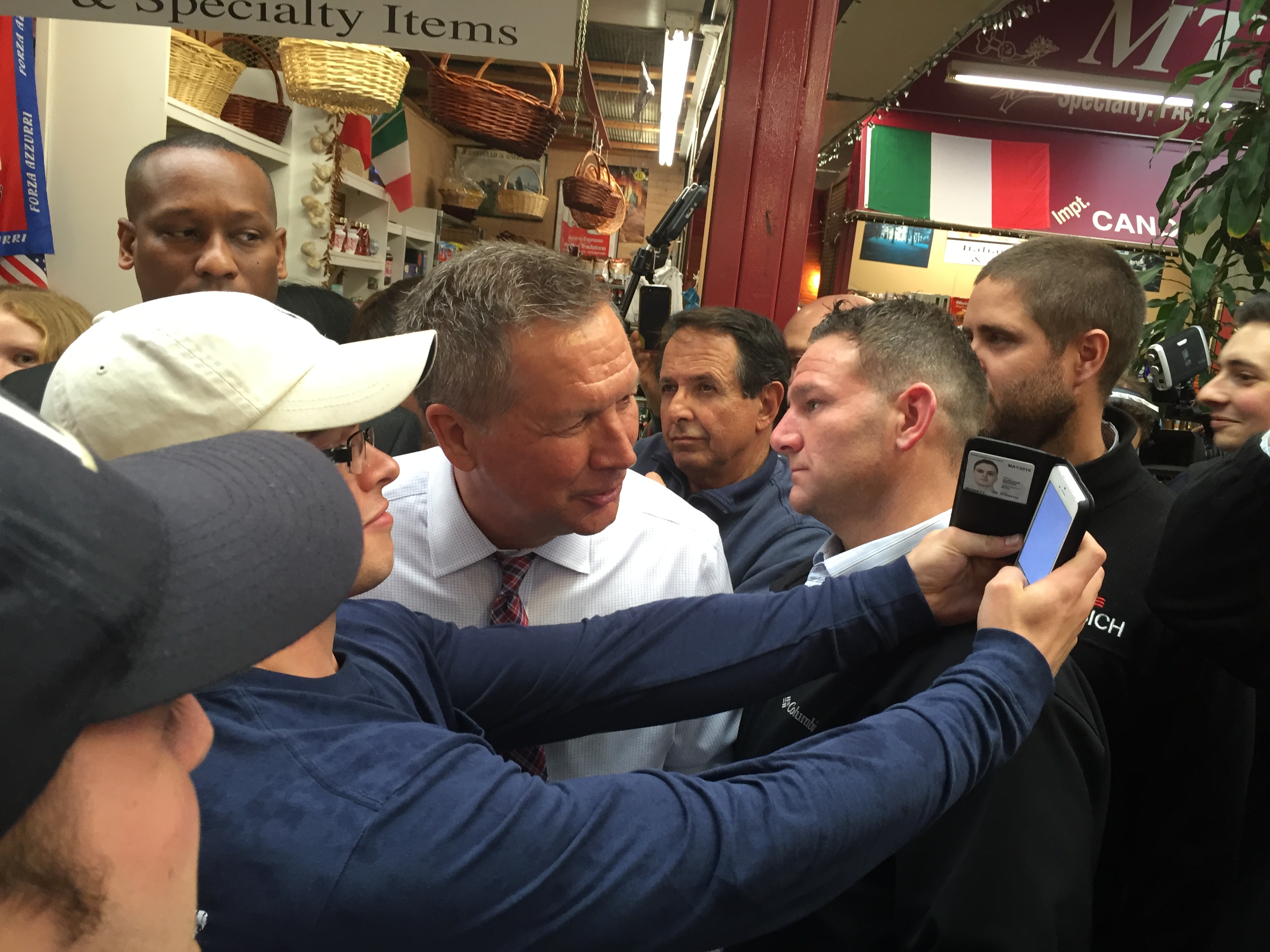 Ohio Gov. John Kasich poses for a selfie with Fordham University students in the Bronx.