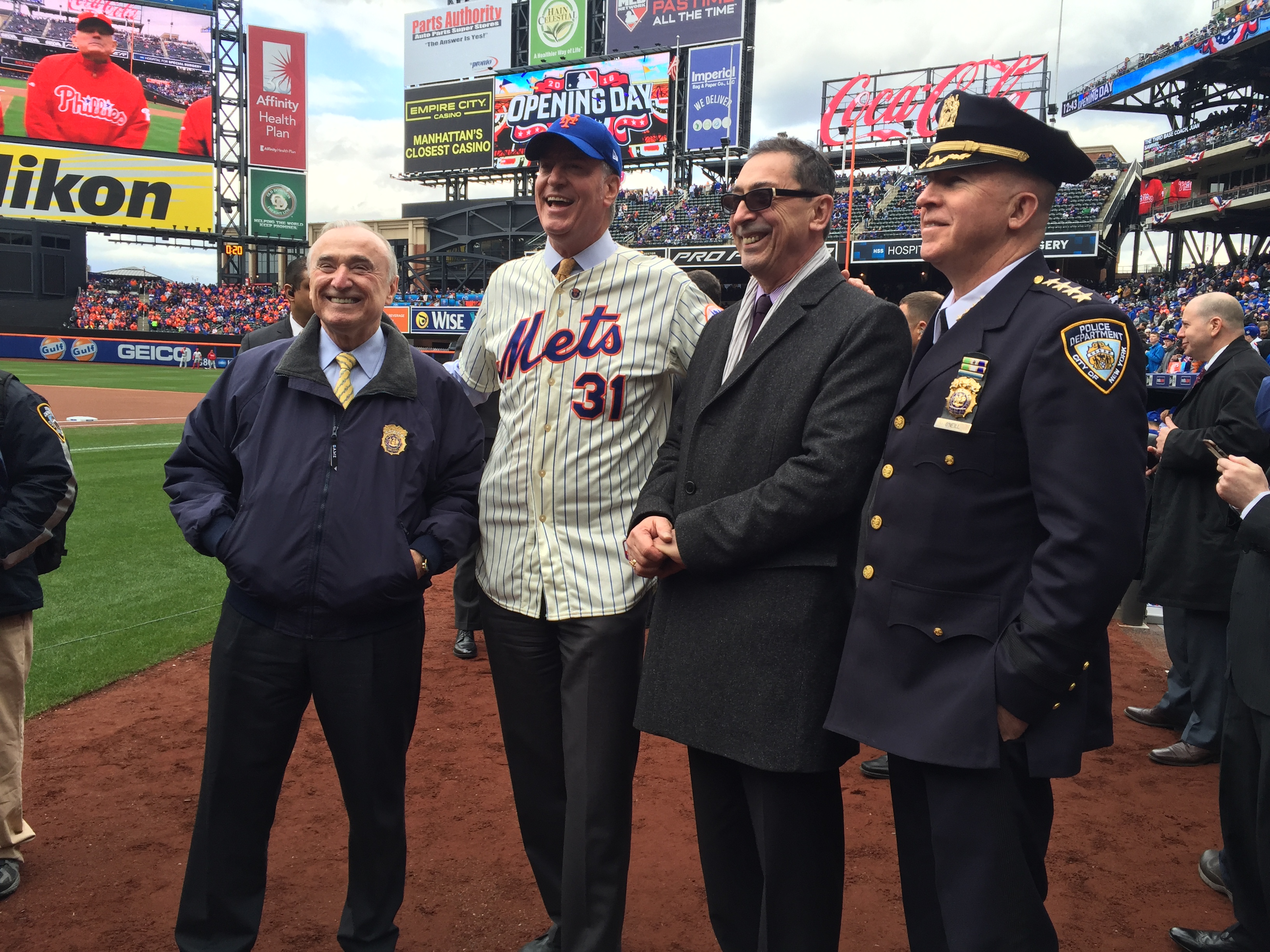 Police Commissioner Bill Bratton, Mayor Bill de Blasio, Fire Commissioner Daniel Nigro, and Chief of Department James O'Neill.