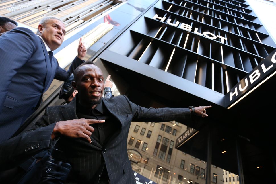 Ricardo Guadalupe, CEO of Hublot, and Usain Bolt at Hublot 5th Avenue Boutique Opening