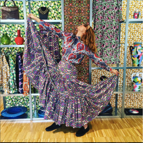 A customer in front of LaDoubleJ's 'Wunderwall'