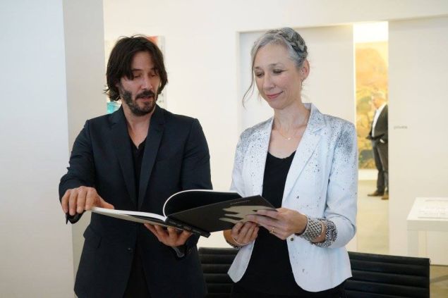 Keanu Reeves and Alexandra Grant at "Shadows" reading and signing at ACME in Los Angeles.