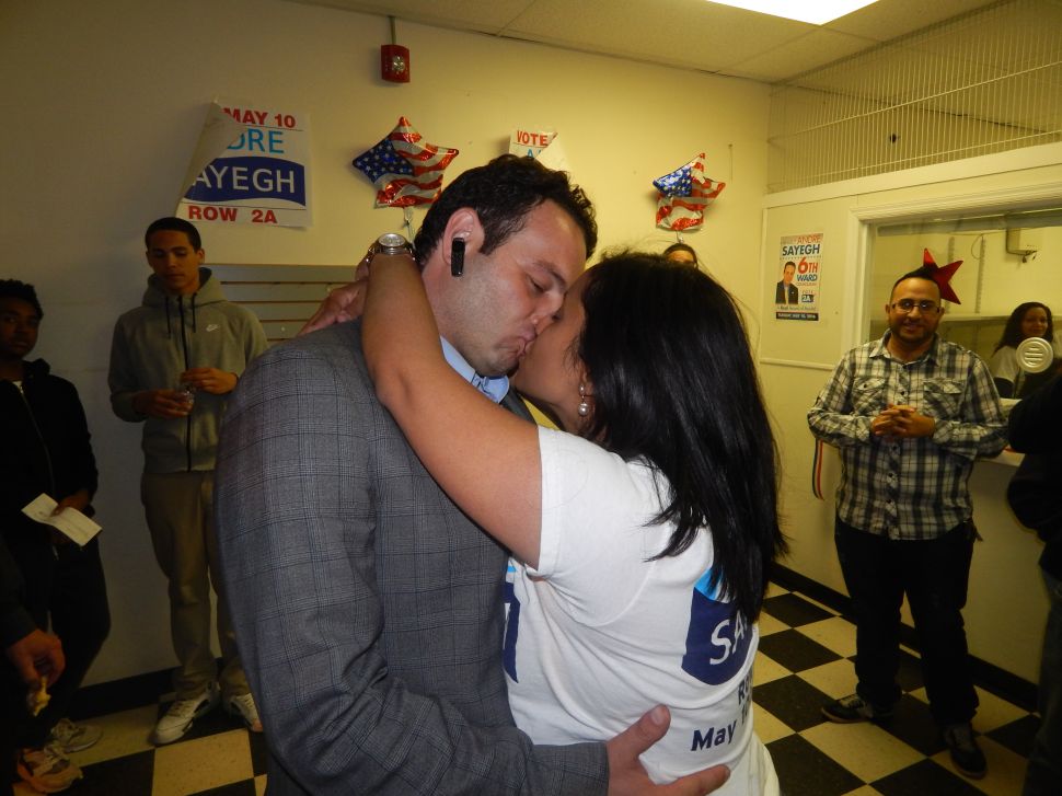 Sayegh and his wife celebrate at campaign headquarters.
