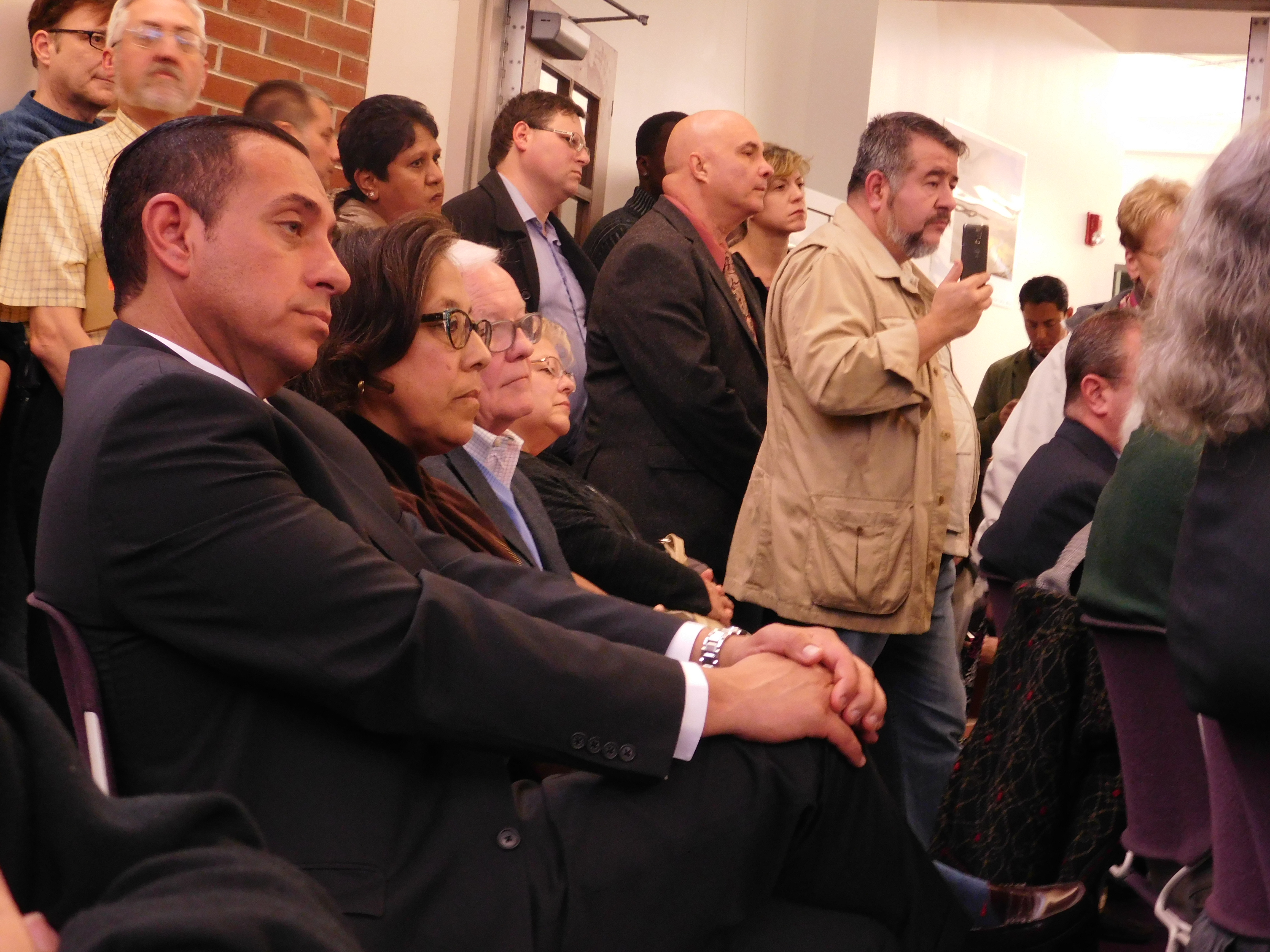 Lopez sits in the crowd at Venezia's meeting.