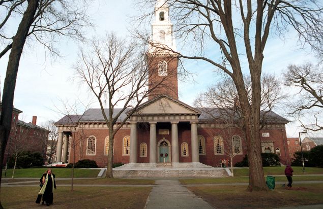People walk around the Harvard University''s main campus December 19, 2000 in Cambridge, MA.