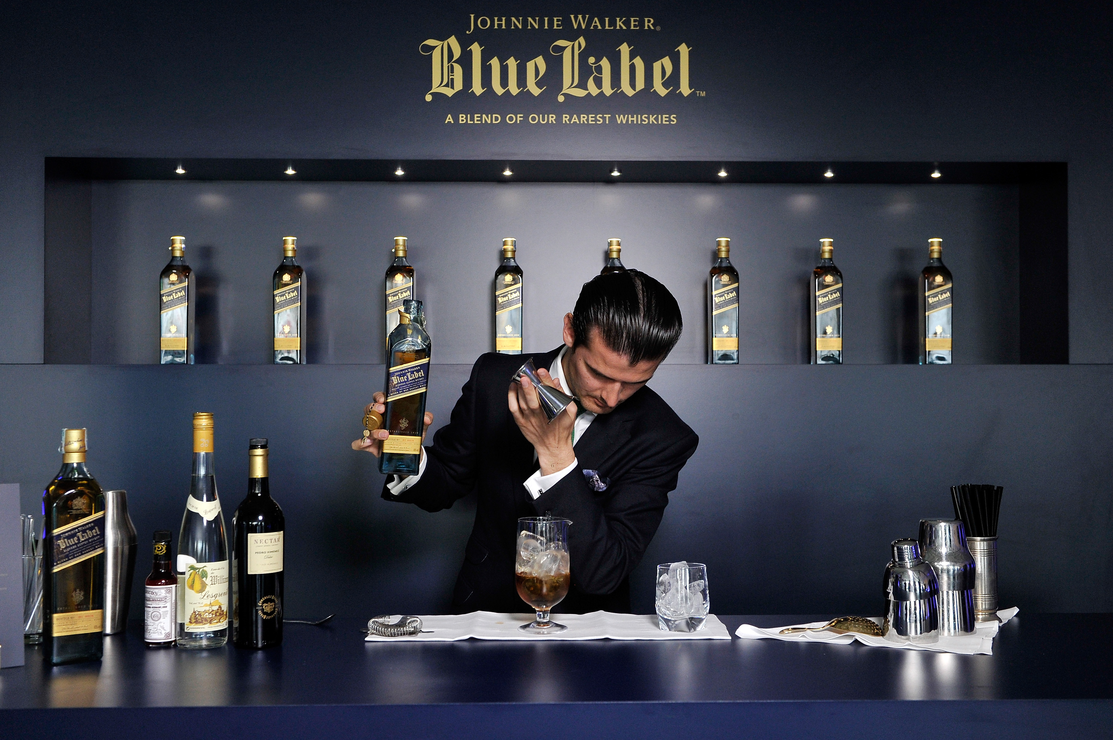 Barman Erik Lorincz is seen making a cocktail as he attends the JOHNNIE WALKER BLUE LABEL drinks reception at the Westin.  
