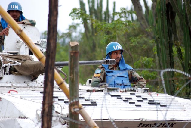 Indian peacekeepers of the Monusco, the UN mission in DRC, patrol on March 11, 2014 on a road near Tongo, some 45 km north of Goma.