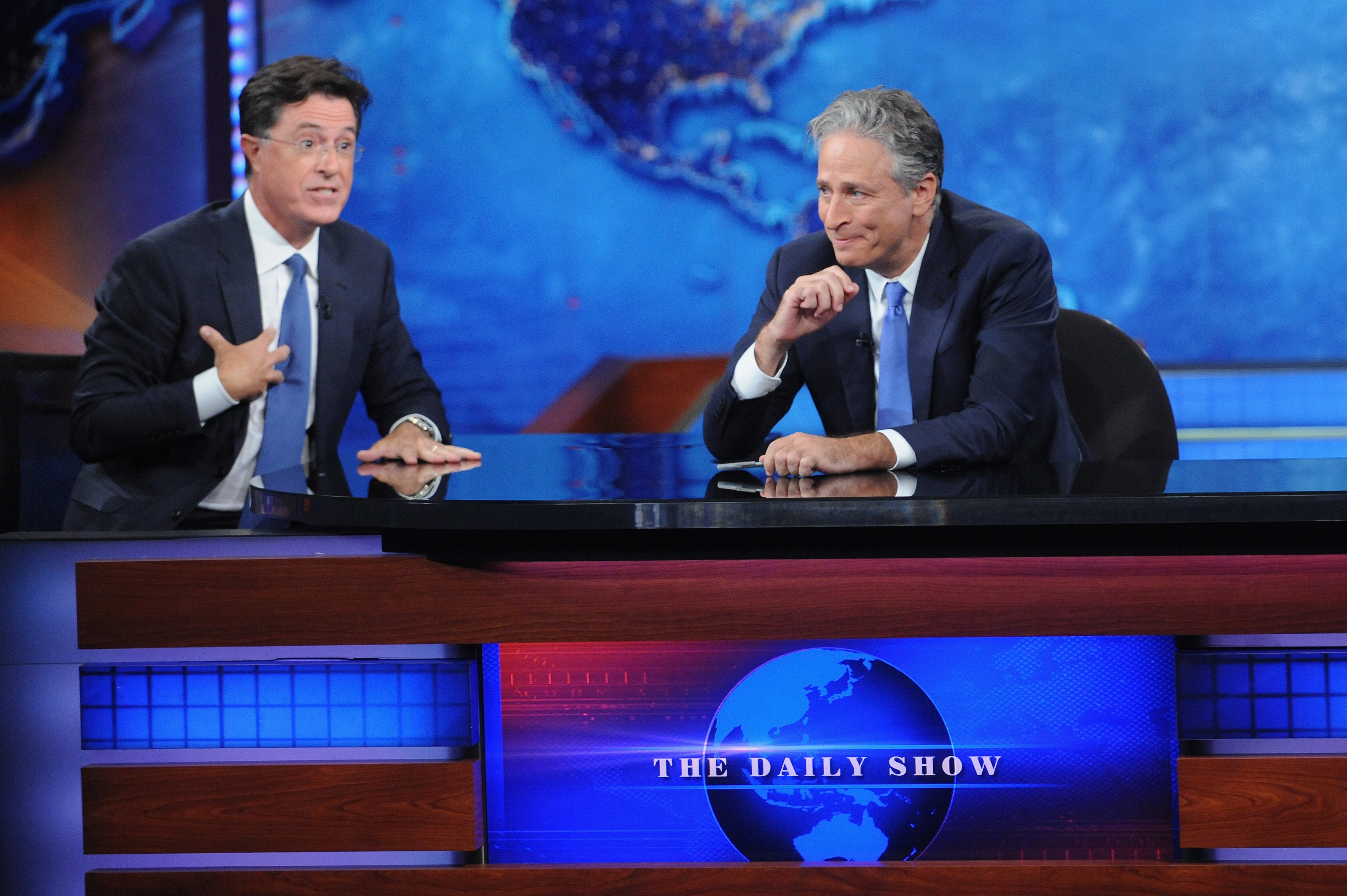 Stephen Colbert and Jon Stewart appear on "The Daily Show with Jon Stewart" #JonVoyage on August 6, 2015 in New York City.