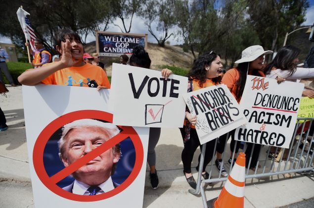 Latinos, immigration and workers' rights advocates and their supporters protest against Donald Trump and other Republican president hopefuls, outside the Republican Presidential Debate at the Ronald Reagan Presidential Library in Simi Valley, California, September 16, 2015. 