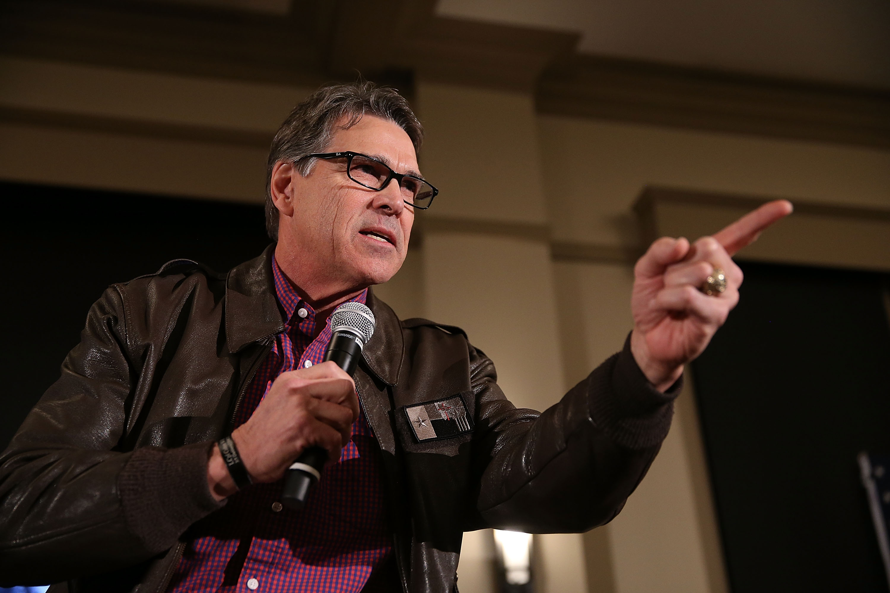 Former Texas Governor Rick Perry talks about how he supports Republican presidential candidate Sen. Ted Cruz (R-TX) before he took to the stage during his campaign event at the Noah's Event Venue on January 27, 2016 in West Des Moines, Iowa. Cruz continues his quest to become the Republican presidential nominee.