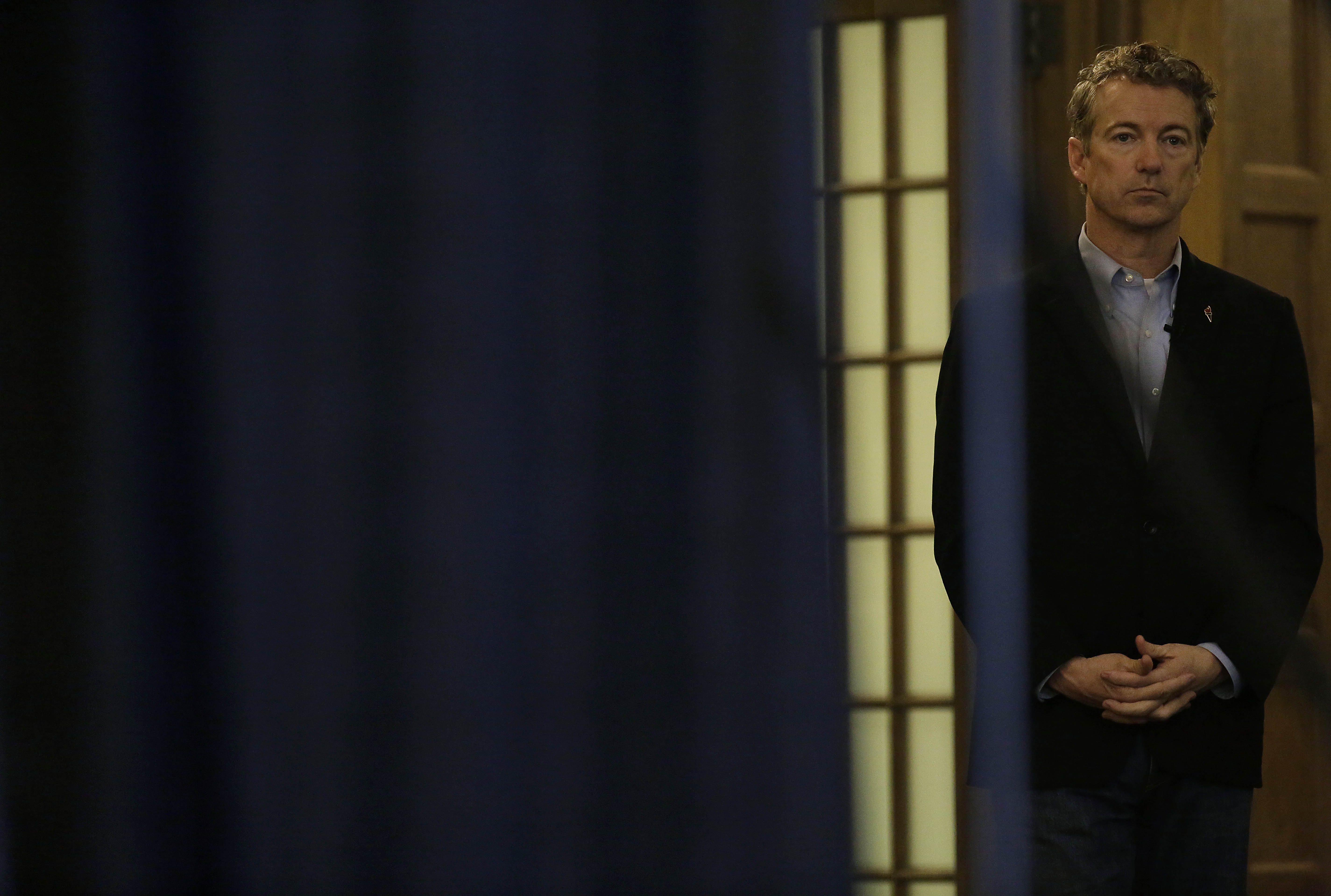 IOWA CITY, IA - JANUARY 31 : Republican presidential candidate, U.S. Sen. Rand Paul (R-KY) stands backstage before being introduced during a campaign event at the University of Iowa Memorial Union January 31, 2016 in Iowa City, Iowa. Paul who is seeking the nomination for the Republican Party is on the presidential campaign trail across Iowa ahead of the Iowa Caucus taking place Monday, a week before the New Hampshire Primaries.