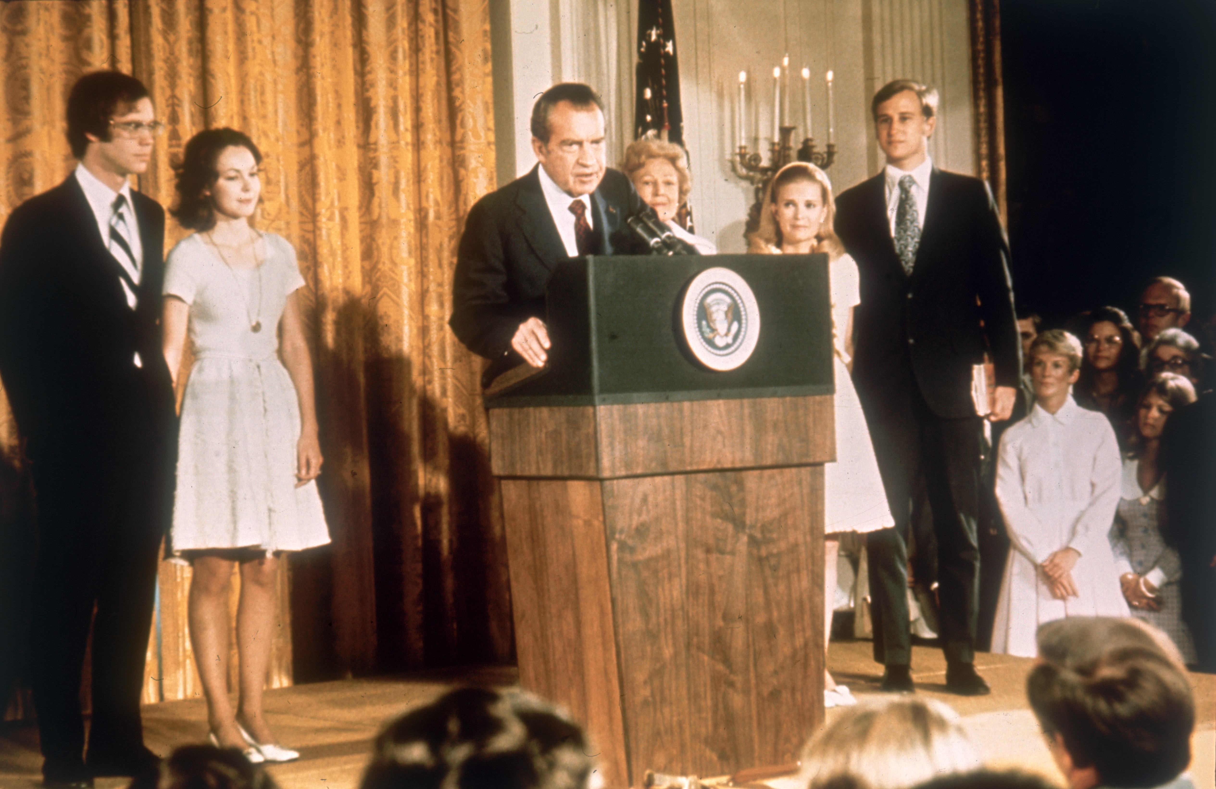 American politician Richard Nixon (1913 - 1994) at the White House with his family after his resignation as President, 9th August 1974. From left, son-in-law David Eisenhower, Julie Nixon-Eisenhower, Richard Nixon, Pat Nixon (1912 - 1993), Tricia Nixon and her husband Edward Cox, August 1974.