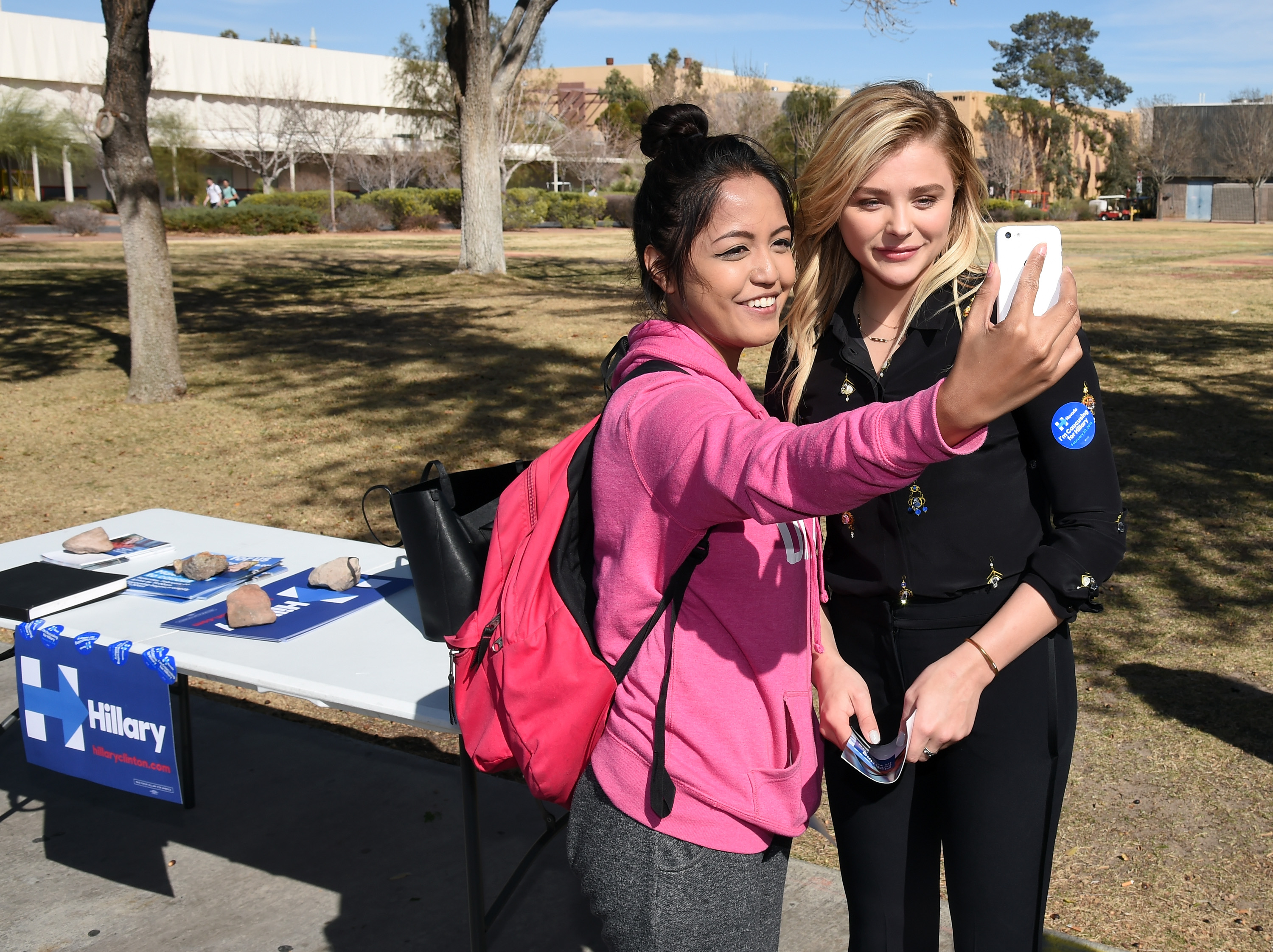 A young voter takes a selfie with actress Chloe Grace Moretz as she campaigns at UNLV for Hillary Clinton