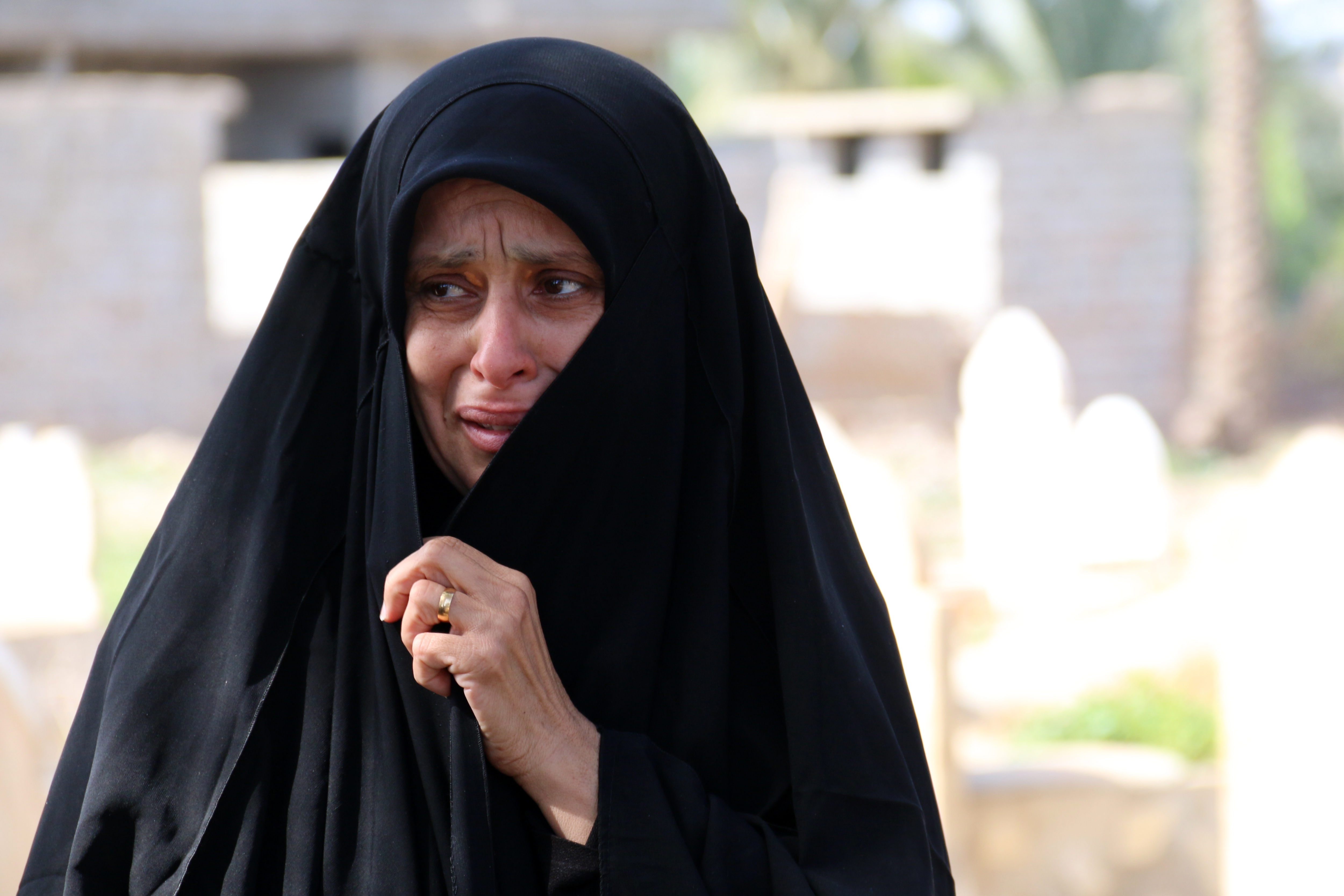 An Iraqi woman mourns during the funeral of Fatima Samir.