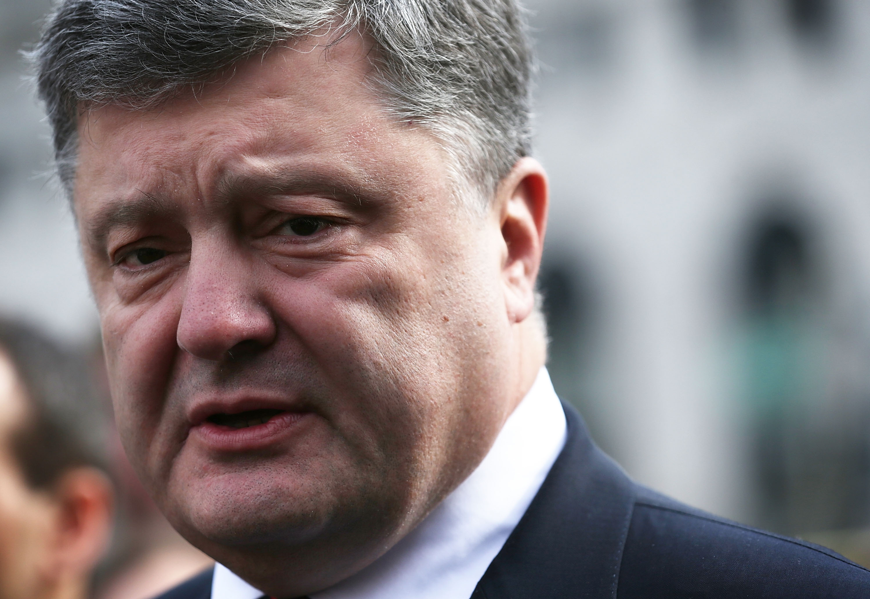 Ukrainian President Petro Poroshenko speaks after he laid a floral basket at the Holodomor Memorial on March 31, 2016 in Washington, DC. Poroshenko is in Washington to attend the 2016 Nuclear Security Summit.
