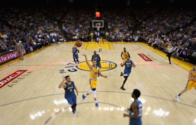 Stephen Curry #30 of the Golden State Warriors goes up for a shot against the Minnesota Timberwolves at ORACLE Arena on April 5, 2016 in Oakland, California.