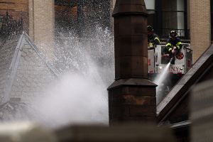 Firefighters fight the blaze at the Serbian Orthodox Cathedral of St. Sava
