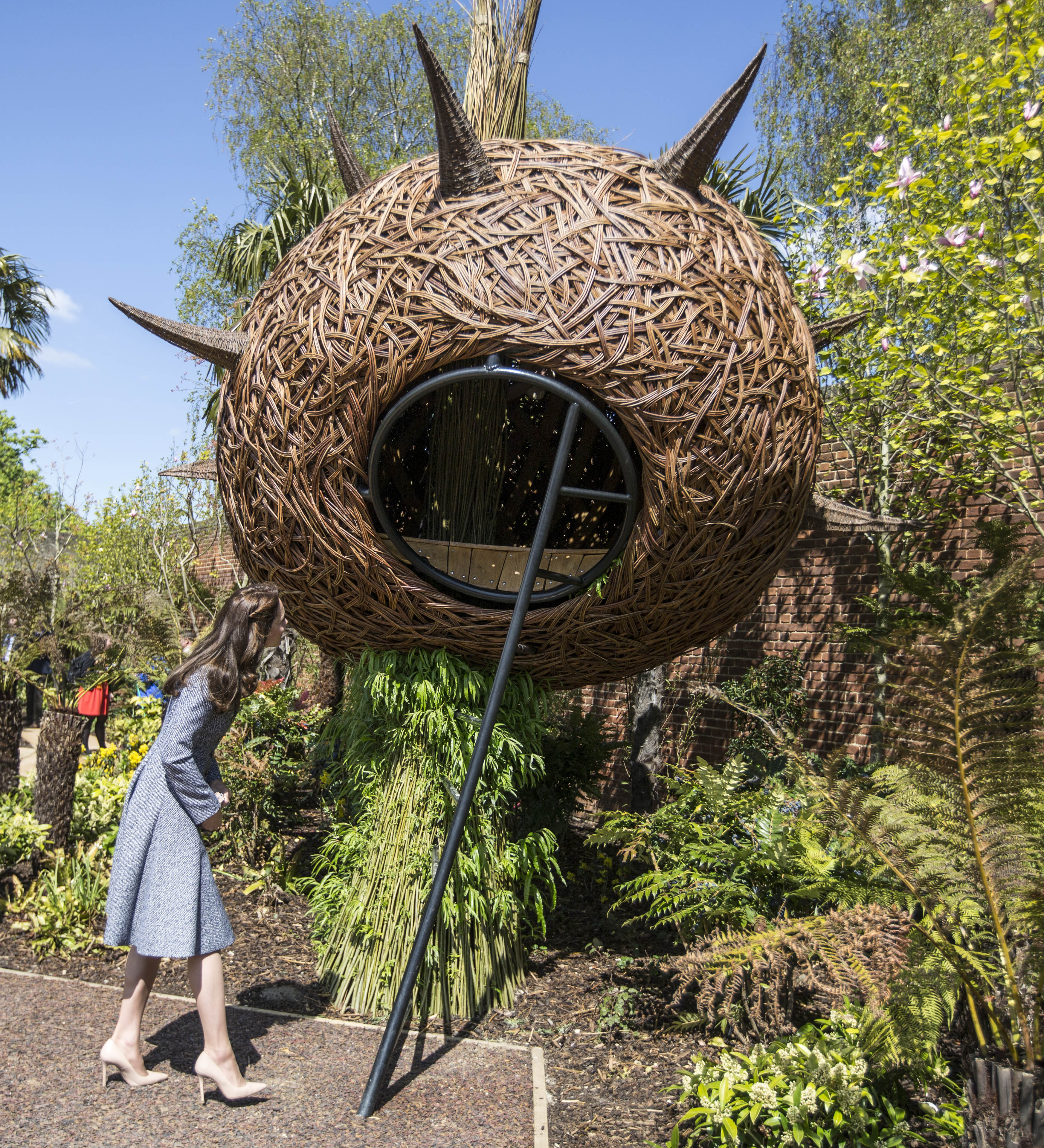 LONDON, ENGLAND - MAY 04: Catherine, Duchess of Cambridge looks at a "Dragons nest" play area as she officially opens The Magic Garden at Hampton Court Palace on May 4, 2016 in London, England. (Photo by Ri