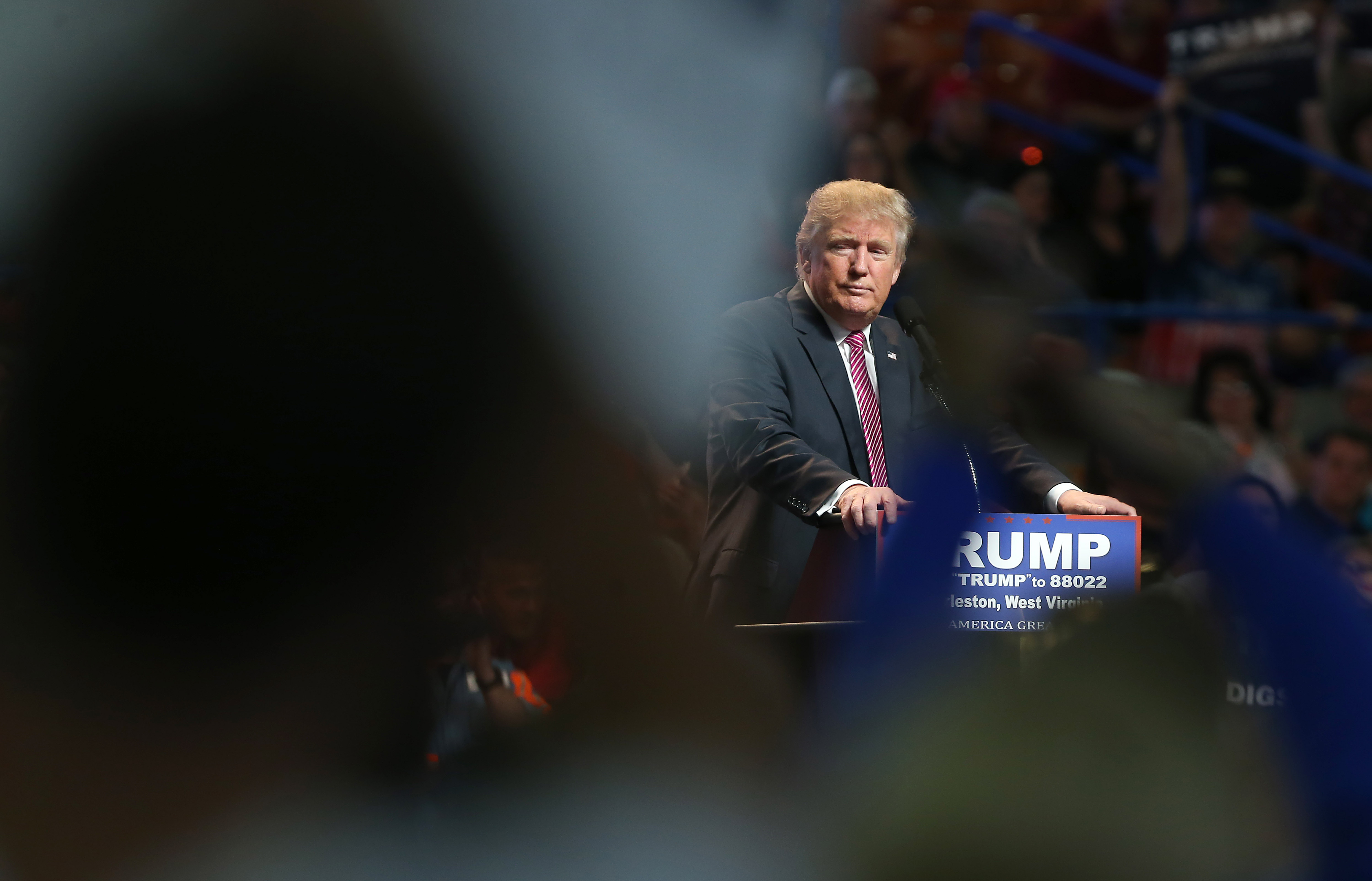 Republican Presidential candidate Donald Trump pauses during his rally at the Charleston Civic Center on May 5, 2016 in Charleston, West Virginia. Trump became the Republican presumptive nominee following his landslide win in indiana on Tuesday.