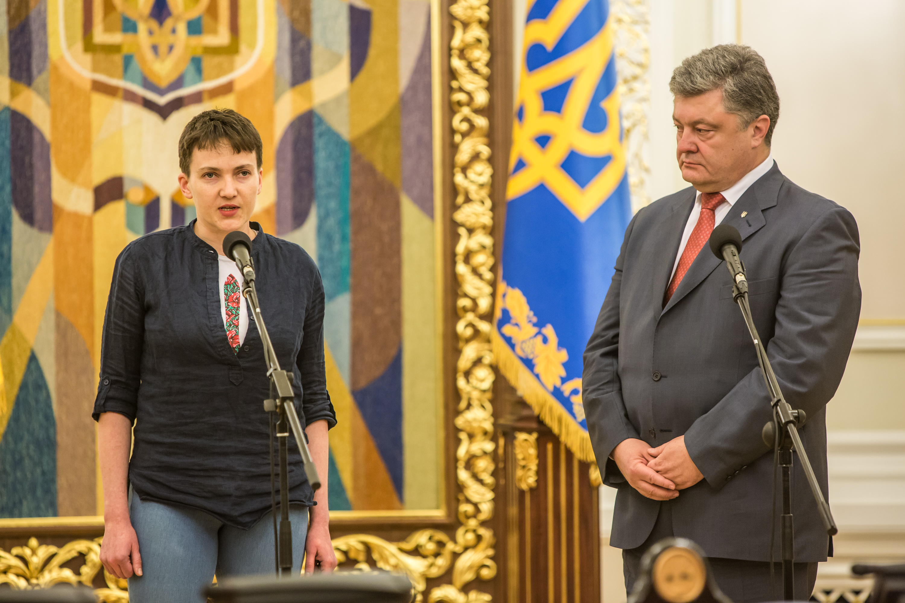 Ukrainian military pilot Nadiya Savchenko (L) joins Ukrainian president Petro Poroshenko to address the media at the Presidential Administration building following Savchenko's return to Ukraine on May 25, 2016 in Kiev, Ukraine. Savchenko was captured while fighting Russia-backed rebels in eastern Ukraine and put on trial in Russia on charges that she was complicit in the deaths of two Russian journalists. She was elected to the Ukrainian parliament under Tymoshenko's Fatherland party while being held in Russia, and in March she was convicted of murder and sentenced to 22 years in prison, but was reportedly swapped for two Russian fighters captured by Ukrainian forces.