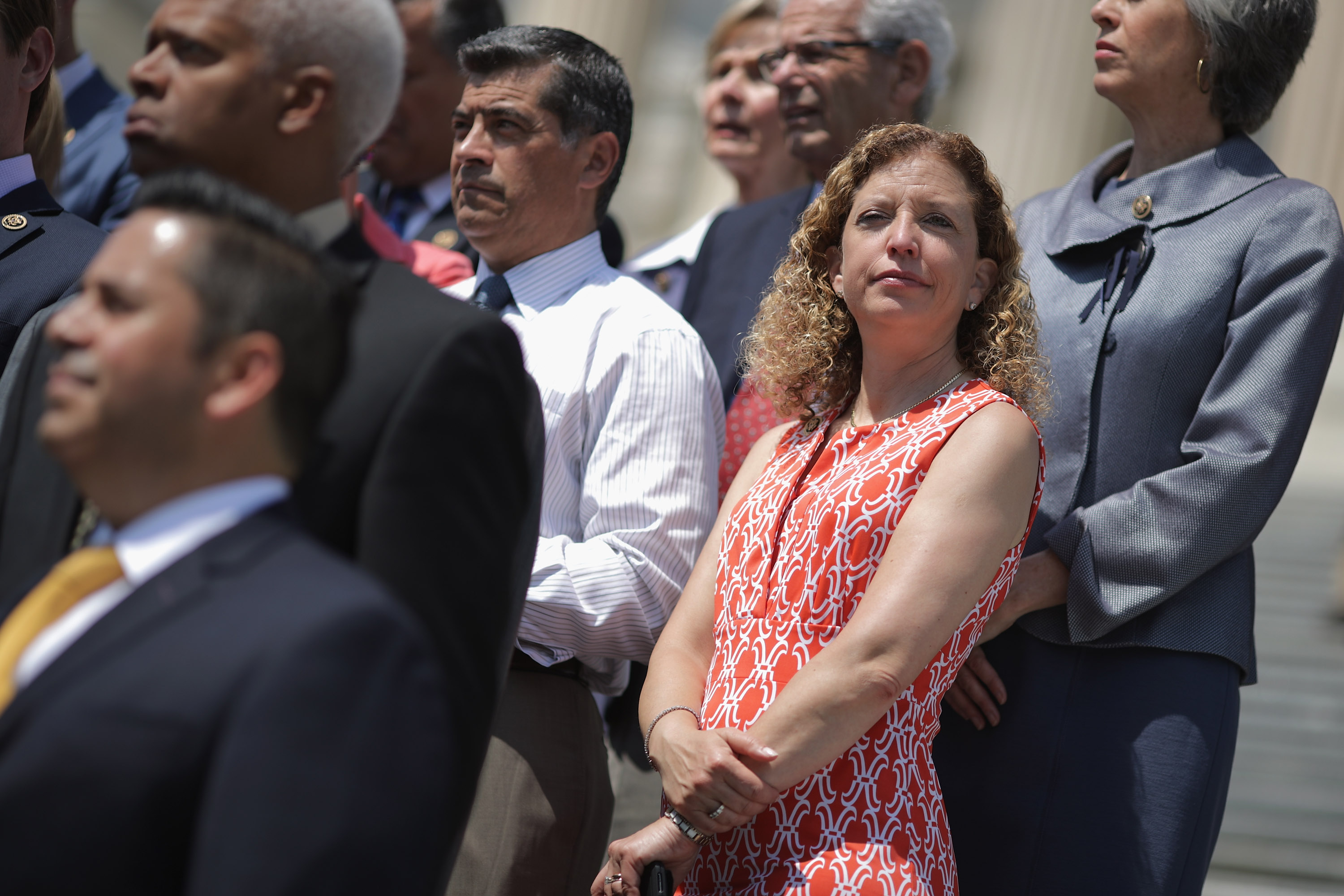 Democratic National Committee Chair Rep. Debbie Wasserman Shultz (D-FL) (C) joins fellow congressional Democrats to call on Republicans to postpone the Memorial Day holiday recess on the steps of the House of Representatives at the U.S. Capitol May 26, 2016 in Washington, DC. Democratic presidential candidate Sen. Bernie Sanders' (D-VT) campaign manager said, 'I think someone else could play a more positive role' as chair of the DNC than Wasserman Schultz, sparking rumors of her being forced from the position.