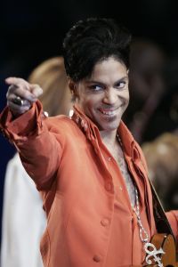 MIAMI BEACH, UNITED STATES: Recording star Prince performs during a press conference 01 February 2007 at the Super Bowl media center on Miami Beach, Florida. Prince will give the half-time performance at Super Bowl XLI 04 February 2007 when the Chicago Bears face the Indianapolis Colts. AFP PHOTO/ROBERT SULLIVAN (Photo credit should read ROBERT SULLIVAN/AFP/Getty Images)