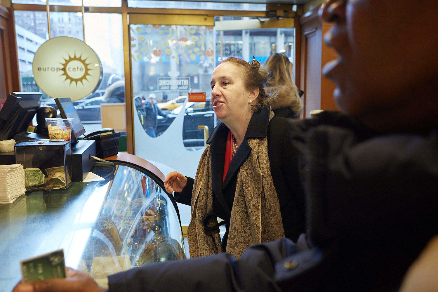 Gale Brewer ordering her first coffee of the day after a morning meeting on 7th Avenue.