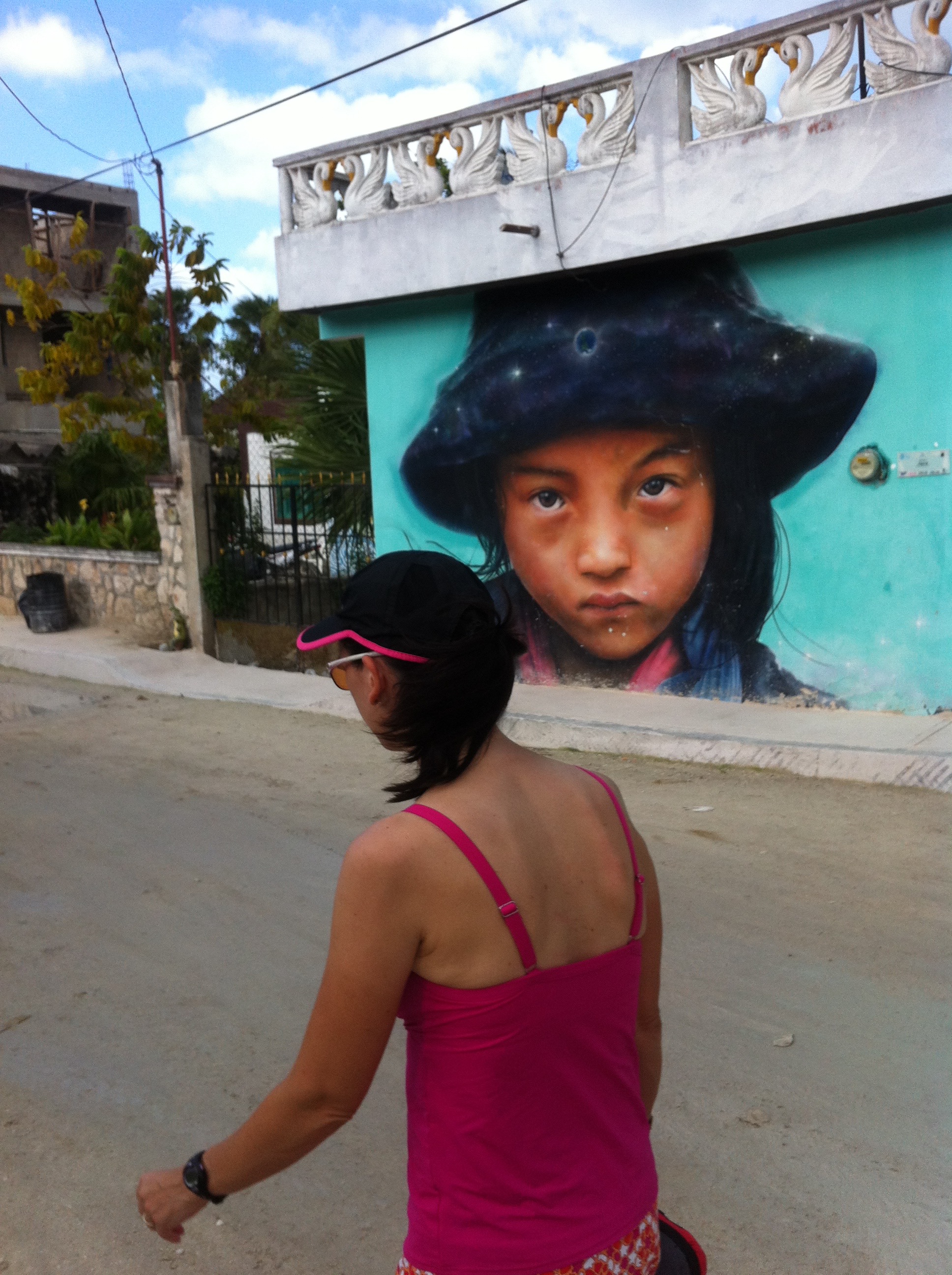 Murals decorate many buildings on the dusty streets of Isla Holbox.
