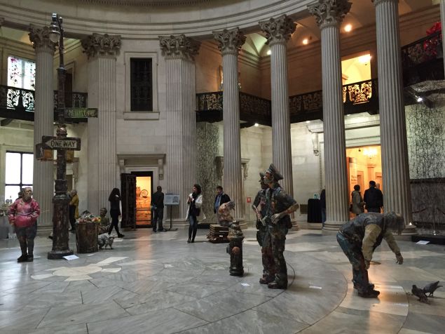 Visitors walk among sculptures by Will Kurtz in Federal Hall's rotunda at the inaugural Portal art fair.