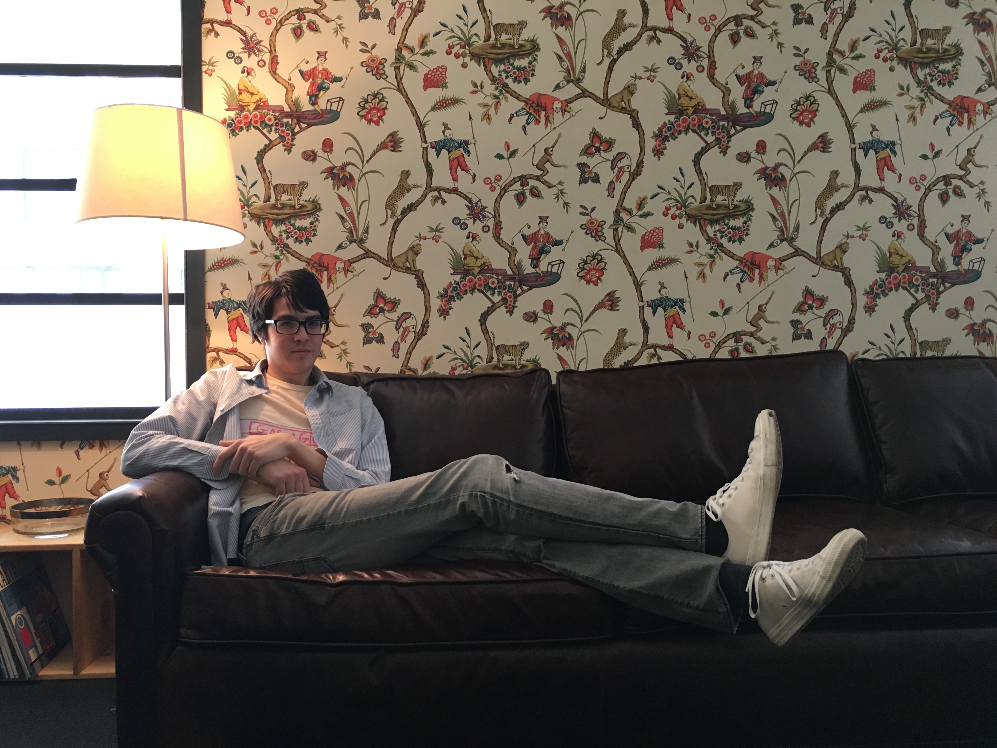 Will Toldeo, chillin' on a couch in the Matador office.