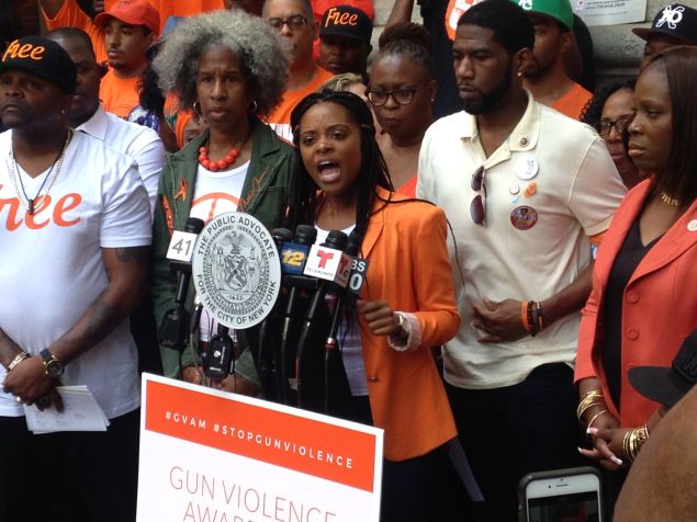 Tamika Mallory, center, in front of Councilman Jumaane Williams and beside Councilwoman Vanessa Gibson, right.
