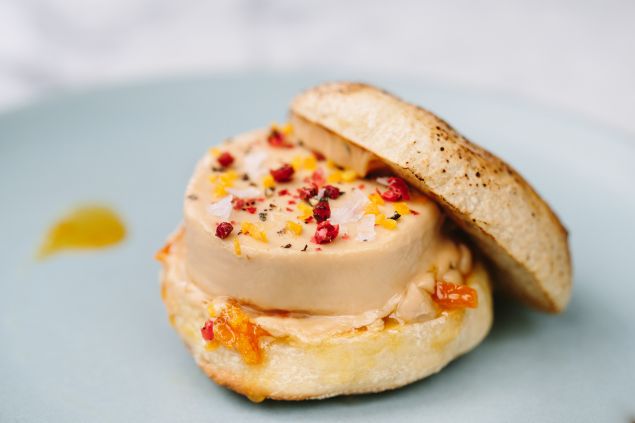 Redbird's Sunday brunch means a foie gras torchon on an English muffin.