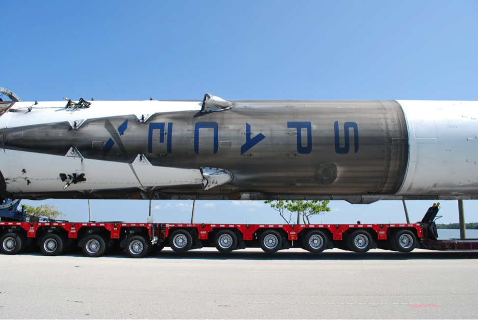 The recovered Falcon 9 first-stage being rolled back to SpaceX’s hangar at Kennedy Space Center