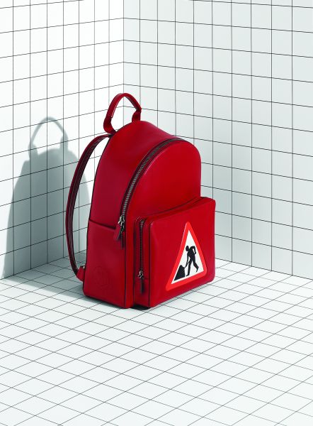A construction sign-inspired backpack
