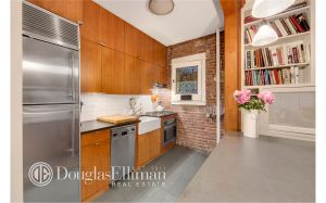 There's exposed brick, but of course.