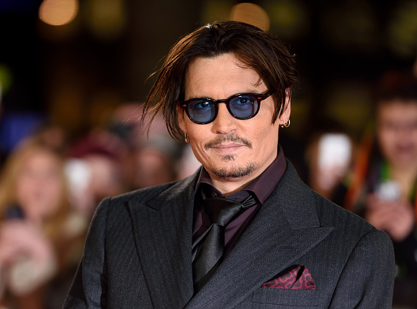 Johnny Depp attends the UK Premiere of "Mortdecai" at Empire Leicester Square on January 19, 2015 in London, England.