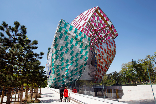 Foundation Louis Vuitton covered by a temporary artwork by French artist Daniel Buren titled Observatory of Light, Work in Situ.