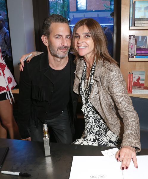 Marc Jacobs and queen Carine at his bookstore, Bookmarc.