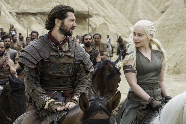 Michiel Huisman as Daario Naharis and Emilia Clarke as Daenerys Targaryen.